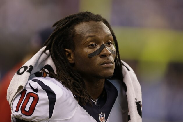 Houston Texans wide receiver DeAndre Hopkins stands on the bench during the first half of an NFL football game against the Indianapolis Colts  in Indianapolis, Sunday, Dec. 15, 2013. (AP Photo/Darron Cummings)