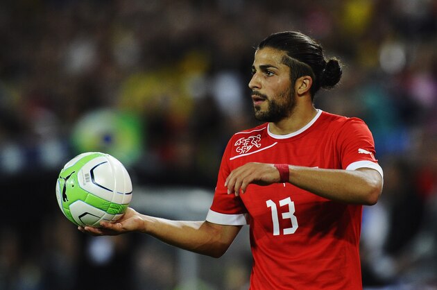 BASEL, SWITZERLAND - AUGUST 14: Ricardo Rodriguez of Switzerland holds a ball during the international friendly match between Switzerland and Brazil at St. Jakob Stadium on August 14, 2013 in Basel, Switzerland.  (Photo by Daniel Kopatsch/Getty Images)