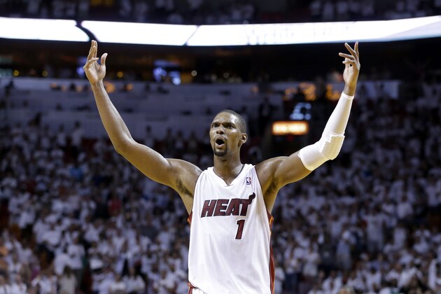 Miami Heat center Chris Bosh celebrates after the Heat defeated the Brooklyn Nets 94-82 in Game 2 of an Eastern Conference semifinal basketball game, Thursday, May 8, 2014 in Miami. (AP Photo/Wilfredo Lee)