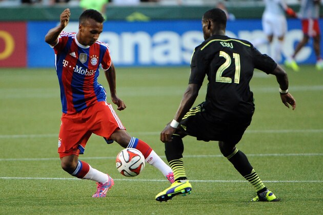 PORTLAND, OR - AUGUST 06: Julian Green #37 of Bayern Munich tries to get by Maurice Edu #21 of the MLS All-Stars during the second half of the game at Providence Park on August 6, 2014 in Portland, Oregon.  (Photo by Steve Dykes/Getty Images)
