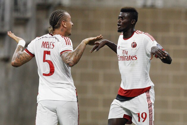 AC Milan forward Mbaye Niang (19) celebrates with Philippe Mexes after scoring in the first half a soccer match against Chivas Guadalajara at NRG Stadium Wednesday, Aug. 6, 2014 in Houston. (AP Photo/Bob Levey) AC Milan forward Mbaye Niang (19) celebrates with Philippe Mexes after scoring in the first half a soccer match against Chivas Guadalajara at NRG Stadium Wednesday, Aug. 6, 2014 in Houston. (AP Photo/Bob Levey)