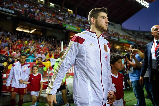 SEVILLE, SPAIN - MAY 30:  Alberto Moreno of Spain walks onto the pitch prior to an international friendly match between Spain and Bolivia at Estadio Ramon Sanchez Pizjuan on May 30, 2014 in Seville, Spain.  (Photo by David Ramos/Getty Images)