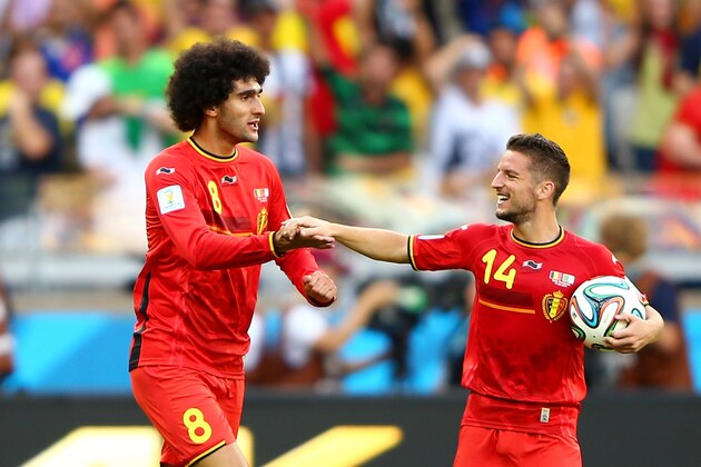 BELO HORIZONTE, BRAZIL - JUNE 17:  Marouane Fellaini of Belgium (L) celebrates scoring his team's first goal with Dries Mertens during the 2014 FIFA World Cup Brazil Group H match between Belgium and Algeria at Estadio Mineirao on June 17, 2014 in Belo Horizonte, Brazil.  (Photo by Ian Walton/Getty Images)