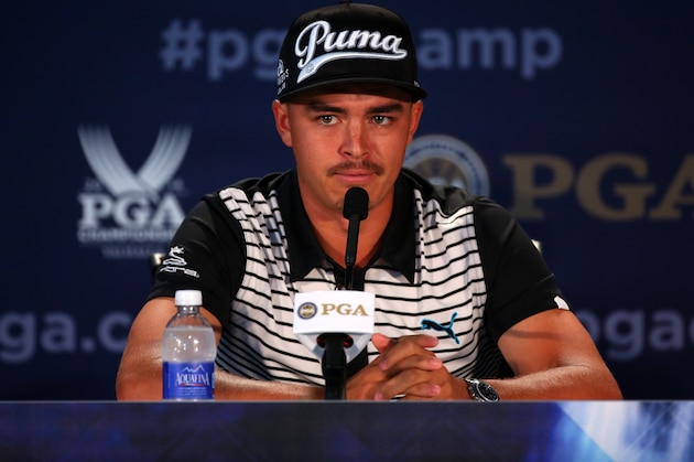 LOUISVILLE, KY - AUGUST 06:  Rickie Fowler of the United States is interviewed during a press conference prior to the start of the 96th PGA Championship at Valhalla Golf Club on August 6, 2014 in Louisville, Kentucky.  (Photo by Mike Ehrmann/Getty Images)