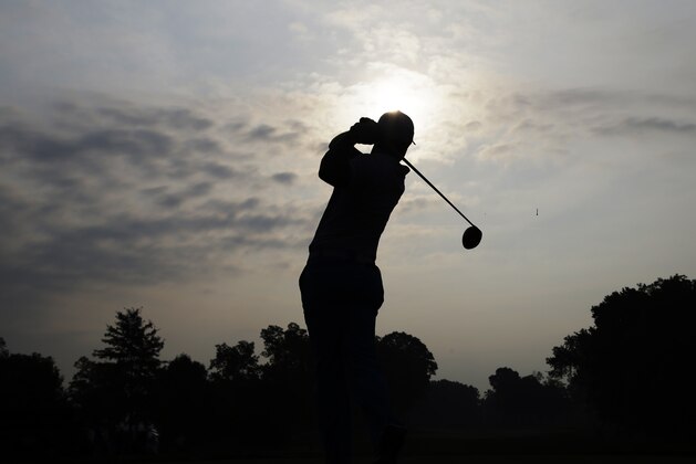 Rory McIlroy, of Northern Ireland, watches his tee shot on the 10th hole during a practice round for the PGA Championship golf tournament at Valhalla Golf Club on Wednesday, Aug. 6, 2014, in Louisville, Ky. The tournament is set to begin on Thursday. (AP Photo/John Locher) Rory McIlroy, of Northern Ireland, watches his tee shot on the 10th hole during a practice round for the PGA Championship golf tournament at Valhalla Golf Club on Wednesday, Aug. 6, 2014, in Louisville, Ky. The tournament is set to begin on Thursday. (AP Photo/John Locher)