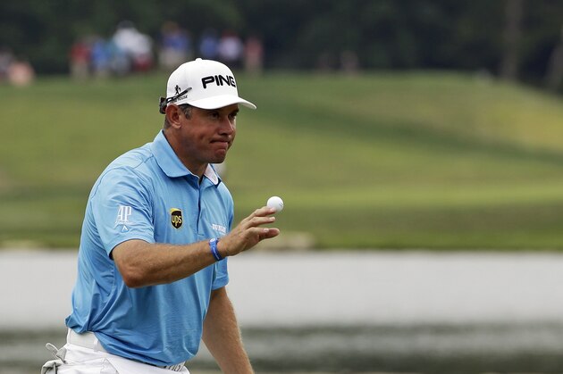 Lee Westwood, of England, reacts after making a birdie on the seventh hole during the first round of the PGA Championship golf tournament at Valhalla Golf Club on Thursday, Aug. 7, 2014, in Louisville, Ky. (AP Photo/David J. Phillip)
