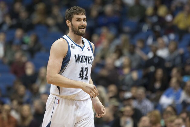 Mar 28, 2014; Minneapolis, MN, USA; Minnesota Timberwolves forward Kevin Love (42) smiles after Minnesota Timberwolves guard Kevin Martin (not pictured) misses a layup in the second half against the Los Angeles Lakers at Target Center. The Timberwolves won 143-107. Mandatory Credit: Jesse Johnson-USA TODAY Sports Mar 28, 2014; Minneapolis, MN, USA; Minnesota Timberwolves forward Kevin Love (42) smiles after Minnesota Timberwolves guard Kevin Martin (not pictured) misses a layup in the second half against the Los Angeles Lakers at Target Center. The Timberwolves won 143-107. Mandatory Credit: Jesse Johnson-USA TODAY Sports