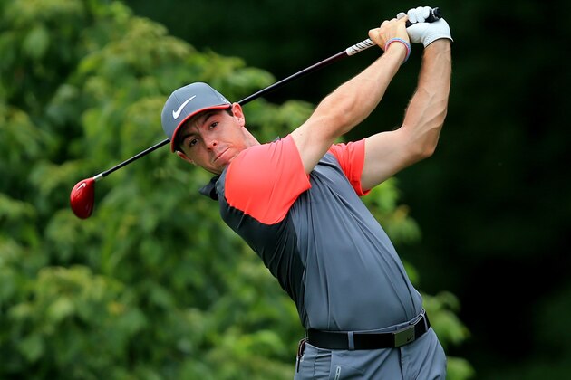 LOUISVILLE, KY - AUGUST 07:  Rory McIlroy of Northern Ireland hits his tee shot on the fourth hole during the first round of the 96th PGA Championship at Valhalla Golf Club on August 7, 2014 in Louisville, Kentucky.  (Photo by David Cannon/Getty Images)