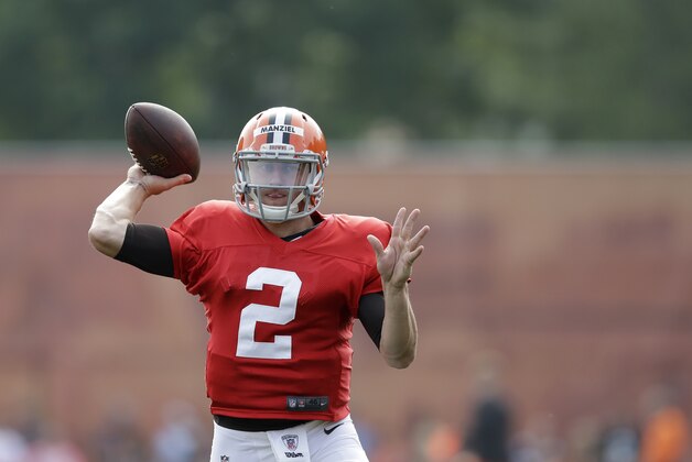 Cleveland Browns quarterback Johnny Manziel passes during practice at the NFL football team's training camp Tuesday, Aug. 5, 2014, in Berea, Ohio. (AP Photo/Tony Dejak) Cleveland Browns quarterback Johnny Manziel passes during practice at the NFL football team's training camp Tuesday, Aug. 5, 2014, in Berea, Ohio. (AP Photo/Tony Dejak)
