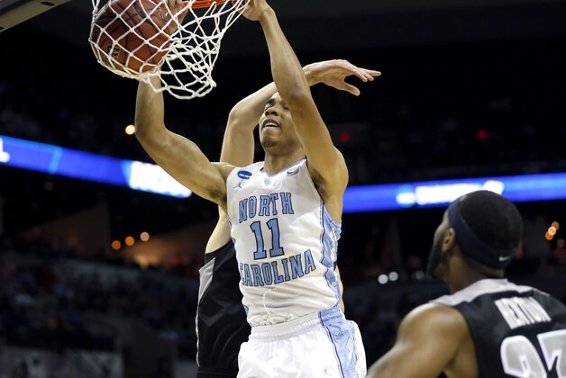 Mar 21, 2014; San Antonio, TX, USA; North Carolina Tar Heels forward Brice Johnson (11) dunks against the Providence Friars in the second half of a men's college basketball game during the second round of the 2014 NCAA Tournament at AT&T Center. Mandatory Credit: Soobum Im-USA TODAY Sports Mar 21, 2014; San Antonio, TX, USA; North Carolina Tar Heels forward Brice Johnson (11) dunks against the Providence Friars in the second half of a men's college basketball game during the second round of the 2014 NCAA Tournament at AT&T Center. Mandatory Credit: Soobum Im-USA TODAY Sports