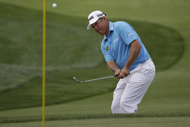 Lee Westwood, of England, hits a chip on the first hole during the first round of the PGA Championship golf tournament at Valhalla Golf Club on Thursday, Aug. 7, 2014, in Louisville, Ky. (AP Photo/David J. Phillip) Lee Westwood, of England, hits a chip on the first hole during the first round of the PGA Championship golf tournament at Valhalla Golf Club on Thursday, Aug. 7, 2014, in Louisville, Ky. (AP Photo/David J. Phillip)