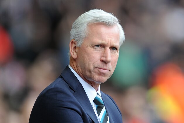 Newcastle United manager Alan Pardew during their English Premier League soccer match against Liverpool at Anfield in Liverpool, England, Sunday May 11, 2014. (AP Photo/Clint Hughes)