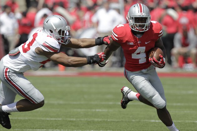 Ohio State running back Curtis Samuel, right, runs around the outside as linebacker Darron Lee defends during their spring NCAA college football game Saturday, April 12, 2014, in Columbus, Ohio. (AP Photo/Jay LaPrete)