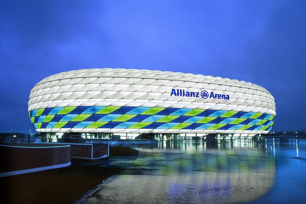 MUNICH, GERMANY - UNDATED: (EDITORIAL USE ONLY - NO COMMERCIALS) In
this handout image from the Allianz Group, the Allianz Arena is illuminated with white, green and blue lights ahead of the UEFA Champions League Final between FC Bayern Munich and Chelsea. The final takes place at the Allianz Arena on May 19, 2012. (Photo by Allianz Group via Getty Images) MUNICH, GERMANY - UNDATED: (EDITORIAL USE ONLY - NO COMMERCIALS) In
this handout image from the Allianz Group, the Allianz Arena is illuminated with white, green and blue lights ahead of the UEFA Champions League Final between FC Bayern Munich and Chelsea. The final takes place at the Allianz Arena on May 19, 2012. (Photo by Allianz Group via Getty Images)