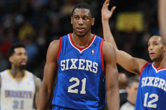 Philadelphia 76ers forward Thaddeus Young looks on against the Denver Nuggets in the fourth quarter of the Sixers' 114-102 victory in an NBA basketball game in Denver on Wednesday, Jan. 1, 2014. (AP Photo/David Zalubowski)
