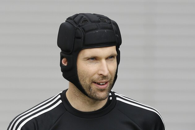 Chelsea's Petr Cech arrives for a training session at Cobham in England Tuesday, April 29, 2014. Chelsea will play a Champions League semifinal second leg soccer match against Atletico Madrid on Wednesday. (AP Photo/Kirsty Wigglesworth)