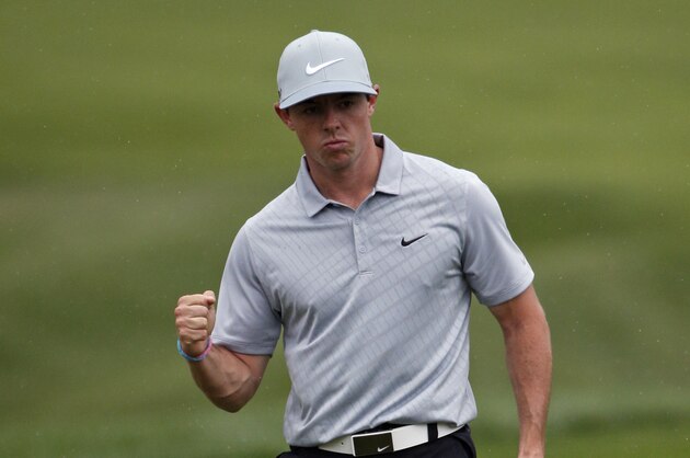 Rory McIlroy, of Northern Ireland, celebrates an eagle on the 18th hole during the second round of the PGA Championship golf tournament at Valhalla Golf Club on Friday, Aug. 8, 2014, in Louisville, Ky. (AP Photo/Mike Groll)
