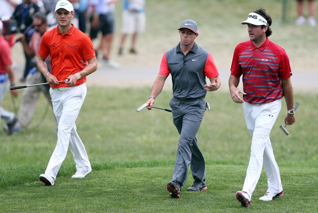 Aug 7, 2014; Louisville, KY, USA; PGA golfers from left to right Martin Kaymer, Rory McIlroy, and Bubba Watson walk up the14th fairway during the first round of the 2014 PGA Championship golf tournament at Valhalla Golf Club. Mandatory Credit: Brian Spurlock-USA TODAY Sports Aug 7, 2014; Louisville, KY, USA; PGA golfers from left to right Martin Kaymer, Rory McIlroy, and Bubba Watson walk up the14th fairway during the first round of the 2014 PGA Championship golf tournament at Valhalla Golf Club. Mandatory Credit: Brian Spurlock-USA TODAY Sports