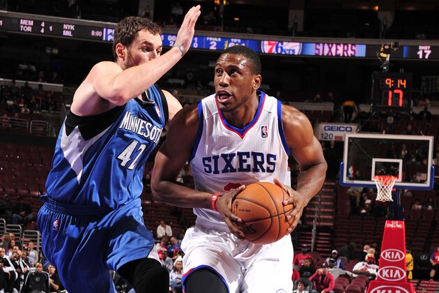 PHILADELPHIA, PA - OCTOBER 23:  Thaddeus Young #21 of the Philadelphia 76ers drives to the basket against Kevin Love #42 of the Minnesota Timberwolves at the Wells Fargo Center on October 23, 2013 in Philadelphia, Pennsylvania. NOTE TO USER: User expressly acknowledges and agrees that, by downloading and or using this photograph, User is consenting to the terms and conditions of the Getty Images License Agreement. Mandatory Copyright Notice: Copyright 2013 NBAE (Photo by David Dow/NBAE via Getty Images)