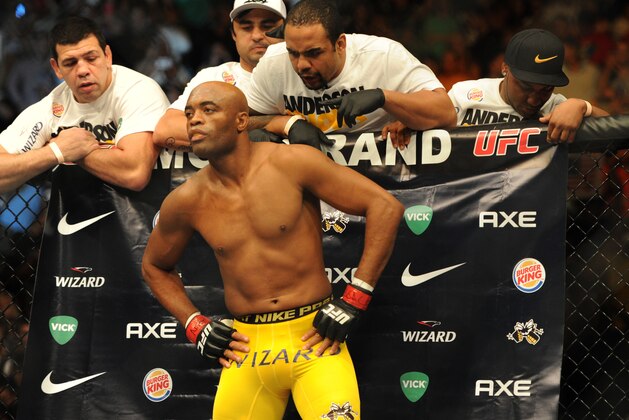 Jul 6, 2013; Las Vegas, NV, USA;  Anderson Silva (yellow shorts) is introduced for his Middleweight Chamionship Bout at the MGM Grand Garden Arena. Chris Weidman defeated Anderson in a TKO in the second round. Mandatory Credit: Jayne Kamin-Oncea-USA TODAY Sports