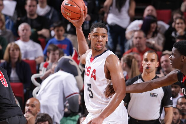 PORTLAND, OR - APRIL 12:  Jahlil Okafor #15 of Team USA looks to pass the ball during the game against the World Team on April 12, 2014 at the Moda Center Arena in Portland, Oregon. NOTE TO USER: User expressly acknowledges and agrees that, by downloading and or using this photograph, user is consenting to the terms and conditions of the Getty Images License Agreement. Mandatory Copyright Notice: Copyright 2014 NBAE (Photo by Sam Forencich/NBAE via Getty Images)