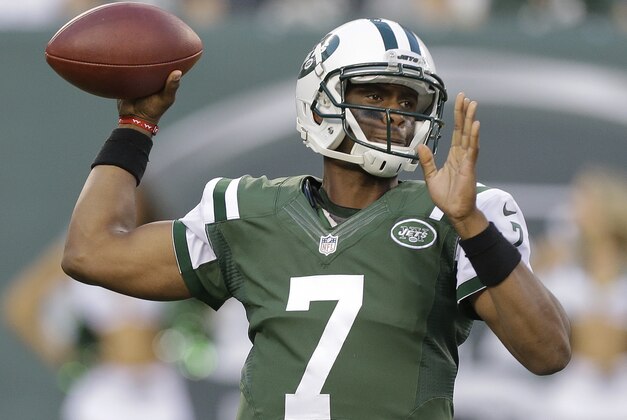 New York Jets quarterback Geno Smith (7) throws against the Indianapolis Colts in the first quarter of an NFL football game, Thursday, Aug. 7, 2014, in East Rutherford, N.J. (AP Photo/Frank Franklin II)