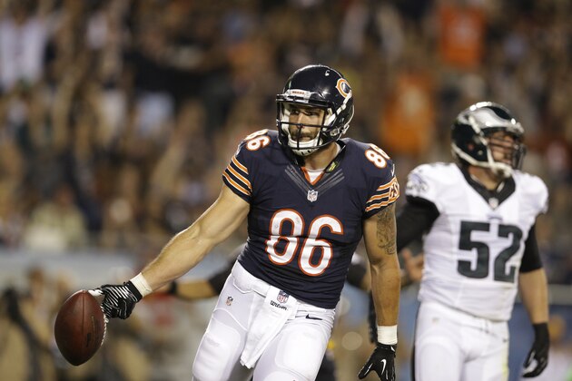 Chicago Bears tight end Zach Miller (86) celebrates after making a touchdown catch against Philadelphia Eagles outside linebacker Jason Phillips (52) in the first half of an NFL preseason football game Friday, Aug. 8, 2014, in Chicago. (AP Photo/Nam Y. Huh)