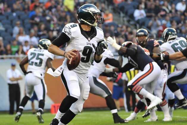 Aug 8, 2014; Chicago, IL, USA;Philadelphia Eagles quarterback Nick Foles (9) looks to pass against the Chicago Bears in the first quarter during a preseason game at Soldier Field. Mandatory Credit: David Banks-USA TODAY Sports
