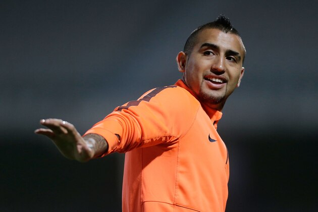 SYDNEY, AUSTRALIA - AUGUST 09:  Arturo Vidal waves to fans during a Juventus training session at WIN Jubilee Stadium on August 9, 2014 in Sydney, Australia.  (Photo by Mark Metcalfe/Getty Images)