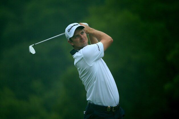 LOUISVILLE, KY - AUGUST 09: Justin Rose of England hits his tee shot on the eighth hole during the third round of the 96th PGA Championship at Valhalla Golf Club on August 9, 2014 in Louisville, Kentucky.  (Photo by Andrew Redington/Getty Images)
