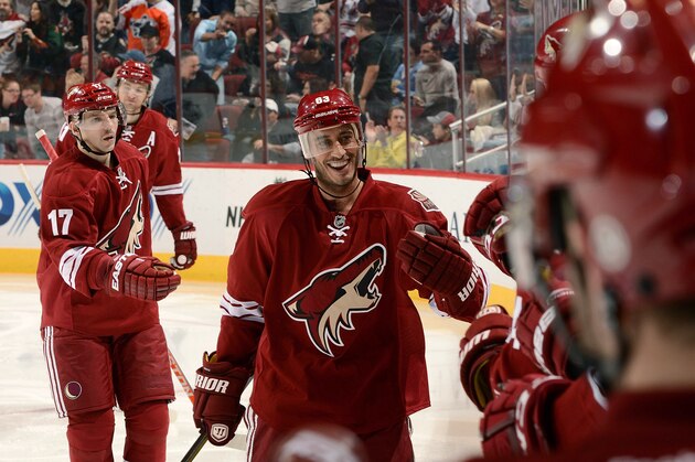 GLENDALE, AZ - NOVEMBER 16:  Mike Ribeiro #63, Radim Vrbata #17 and teammates of the Phoenix Coyotes celebrate a goal against the Tampa Bay Lightning at Jobing.com Arena on November 16, 2013 in Glendale, Arizona.  (Photo by Norm Hall/NHLI via Getty Images)