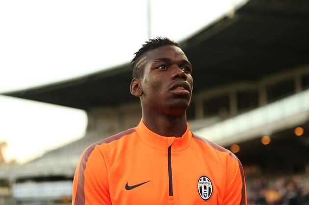 SYDNEY, AUSTRALIA - AUGUST 09:  Paul Pogba arrives to speak to the media prior to a Juventus training session at WIN Jubilee Stadium on August 9, 2014 in Sydney, Australia.  (Photo by Mark Metcalfe/Getty Images)