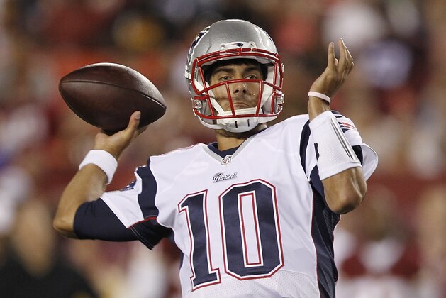 New England Patriots quarterback Jimmy Garoppolo passes the ball during the second half of an NFL football preseason game against the Washington Redskins in Landover, Md., Thursday, Aug. 7, 2014. (AP Photo/Connor Radnovich)