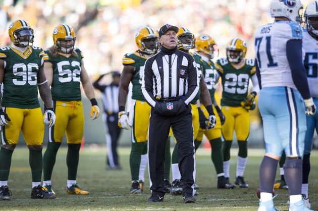 GREEN BAY, WI - DECEMBER 23: Garth DeFelice umpire watches the clock during the game between the Tennessee Titans and Green Bay Packer at Lambeau Field on December 23, 2012 in Green Bay, Wisconsin.  (Photo by Tom Lynn /Getty Images)