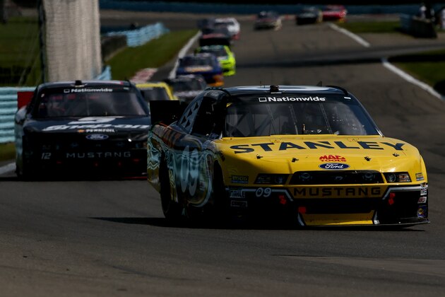 WATKINS GLEN, NY - AUGUST 09:  Marcos Ambrose, driver of the