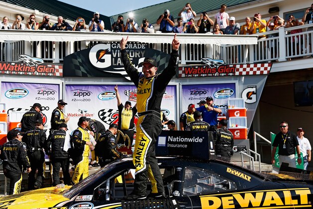 WATKINS GLEN, NY - AUGUST 09: Marcos Ambrose, driver of the #09 Stanley Ford, celebrates in Victory Lane after winning the NASCAR Nationwide Zippo 200 at Watkins Glen International on August 9, 2014 in Watkins Glen, New York. (Photo by Jeff Zelevansky/Getty Images) WATKINS GLEN, NY - AUGUST 09: Marcos Ambrose, driver of the #09 Stanley Ford, celebrates in Victory Lane after winning the NASCAR Nationwide Zippo 200 at Watkins Glen International on August 9, 2014 in Watkins Glen, New York. (Photo by Jeff Zelevansky/Getty Images)