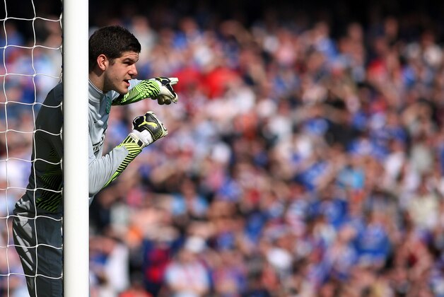 Celtic's goalkeeper Fraser Forster is seen during their Scottish Premier League soccer match against Rangers at Ibrox, Glasgow, Scotland, Sunday, March 25, 2012.(AP Photo/Scott Heppell)