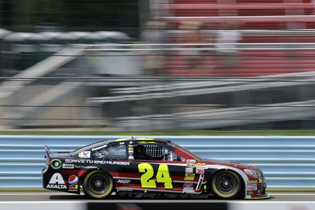 Jeff Gordon (24) drives during a practice session for Sunday's NASCAR Sprint Cup Series auto race at Watkins Glen International, Friday, Aug. 8, 2014, in Watkins Glen N.Y.   (AP Photo/Mel Evans)