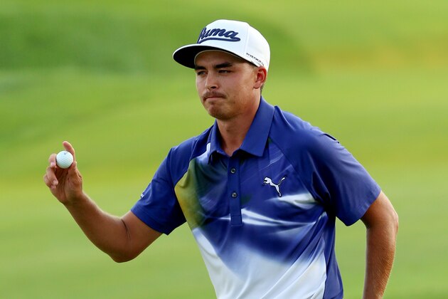 LOUISVILLE, KY - AUGUST 09:  Rickie Fowler of the United States waves as he walks off the fifth green during the third round of the 96th PGA Championship at Valhalla Golf Club on August 9, 2014 in Louisville, Kentucky.  (Photo by Andrew Redington/Getty Images)
