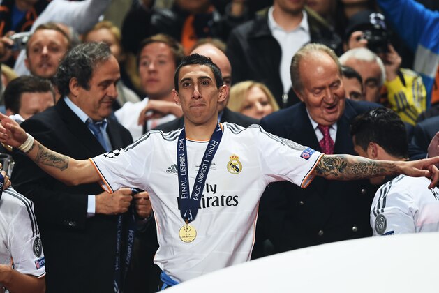 LISBON, PORTUGAL - MAY 24:  Angel Di Maria of Real Madrid celebrates victory after the UEFA Champions League Final between Real Madrid and Atletico de Madrid at Estadio da Luz on May 24, 2014 in Lisbon, Portugal.  (Photo by Laurence Griffiths/Getty Images)