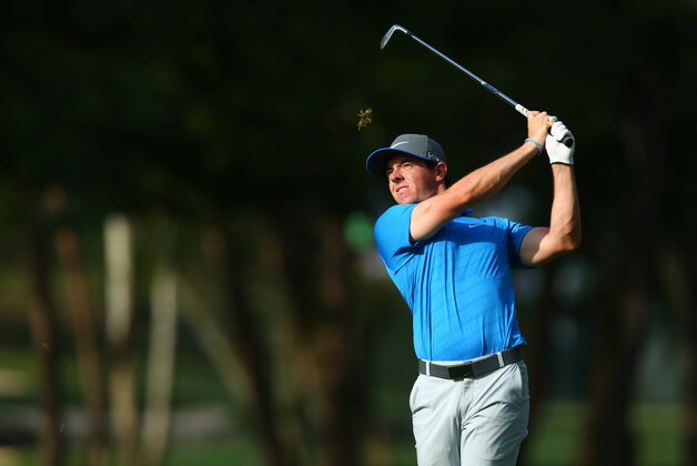 LOUISVILLE, KY - AUGUST 09:  Rory McIlroy of Northern Ireland hits a shot to the 16th green during the third round of the 96th PGA Championship at Valhalla Golf Club on August 9, 2014 in Louisville, Kentucky.  (Photo by Jeff Gross/Getty Images)