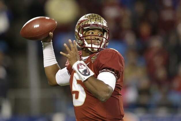 Florida State quarterback Jameis Winston (5) looks to pass against Duke in the first half of the Atlantic Coast Conference Championship NCAA football game in Charlotte, N.C., Saturday, Dec. 7, 2013. (AP Photo/Bob Leverone)