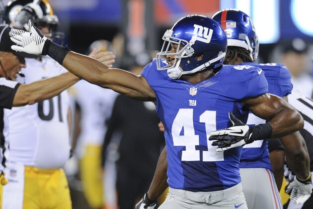 New York Giants defensive back Ross Weaver (41) reacts after the Giants recovered a fumble by the Pittsburgh Steelers in the fourth quarter of a preseason NFL football game, Saturday, Aug. 9, 2014, in East Rutherford, N.J. (AP Photo/Bill Kostroun)