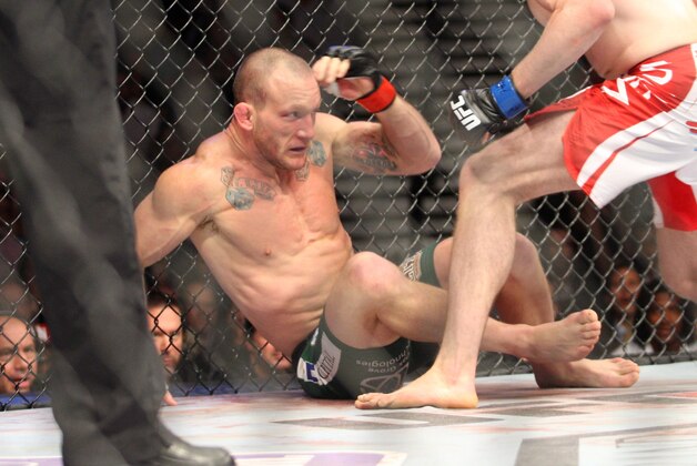 May 25, 2013; Las Vegas, NV, USA; UFC light heavyweight Gray Maynard is pinned by TJ Grant during UFC 160 at the MGM Grand Garden Arena. Mandatory Credit: Bruce Fedyck-USA TODAY Sports