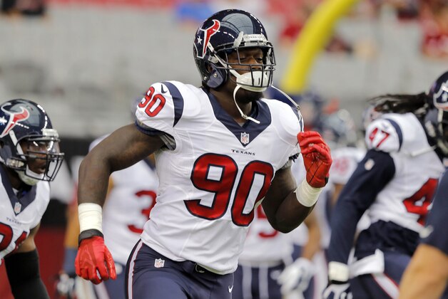 Houston Texans linebacker Jadeveon Clowney (90) warms up prior to an NFL preseason football game against the Arizona Cardinals, Saturday, Aug. 9, 2014, in Glendale, Ariz. (AP Photo/Rick Scuteri)