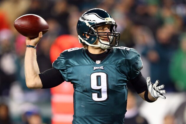 PHILADELPHIA, PA - JANUARY 04:   Nick Foles #9 of the Philadelphia Eagles throws the ball against the New Orleans Saints during their NFC Wild Card Playoff game at Lincoln Financial Field on January 4, 2014 in Philadelphia, Pennsylvania.  (Photo by Elsa/Getty Images)