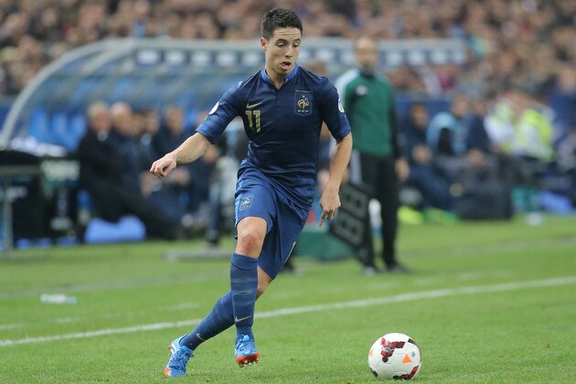 France's Samir Nasri, controls the ball during their group I World Cup qualifying soccer match between France and Finland, at the Stade de France stadium in Saint Denis, outside Paris, Tuesday, Oct. 15, 2013. (AP Photo/Michel Euler)