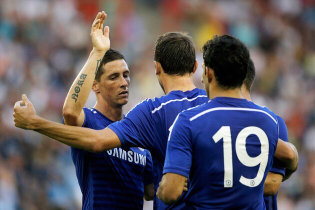 ARNHEM, NETHERLANDS - JULY 30:  Fernando Torres (L) of Chelsea congratulates goal scorer, Nemanja Matic (C) during the pre season friendly match between Vitesse Arnhem and Chelsea at the Gelredome Stadium on July 30, 2014 in Arnhem, Netherlands.  (Photo by Dean Mouhtaropoulos/Getty Images)