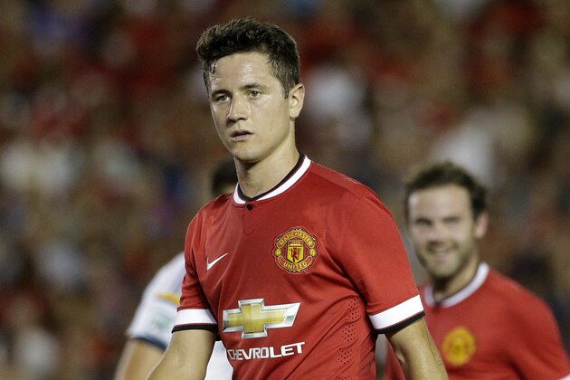 Manchester United's Ander Herrera walks on the field during the first half of a friendly soccer match against the Los Angeles Galaxy at the Rose Bowl on Wednesday, July 23, 2014, in Pasadena, Calif. (AP Photo)