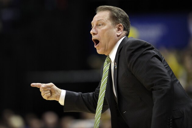 Michigan State head coach Tom Izzo directs his team in the first half of an NCAA college basketball game against Michigan in the championship of the Big Ten Conference tournament on Sunday, March 16, 2014, in Indianapolis. (AP Photo/Kiichiro Sato)